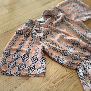 Chic Patterned Romper in Peach and Black